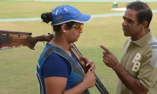 Coach Mansher Singh with Shreyasi Singh