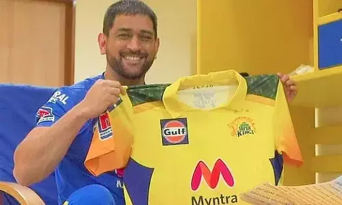 Talismanic skipper unveils the new Chennai Super Kings jersey. [Source: CSK]
