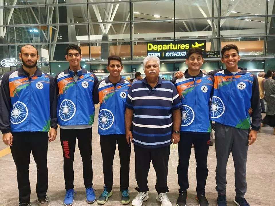 Indian Swimmers with Coach Nihar Ameen