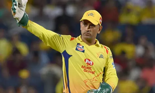 MS Dhoni gesturing towards his players during an IPL match MS Dhoni gesturing towards his players during an IPL match