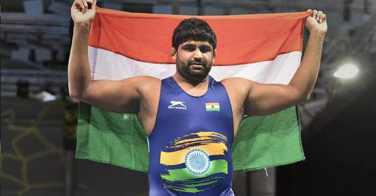 Sumit Malik celebrates after winning quota at the Olympic Games.