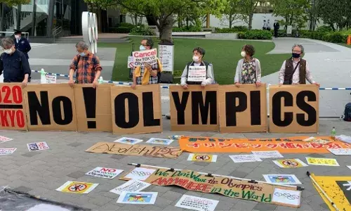Anti-Olympics protestor intrudes International Olympic Committee news conference