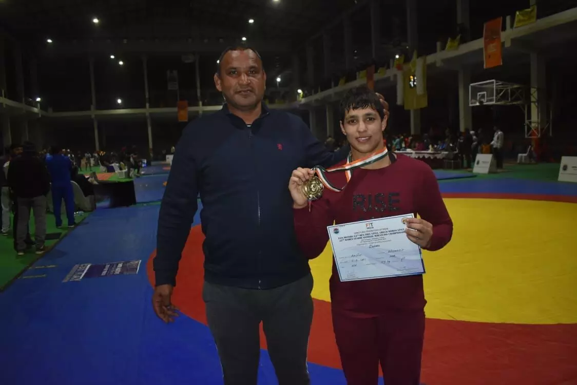 Anshu Malik with father Dharamvir Malik