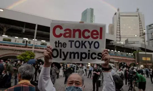 Major Japan newspaper Asahi calls for Olympic cancellation