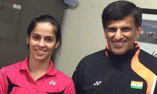 Saina Nehwal with coach Vimal Kumar
