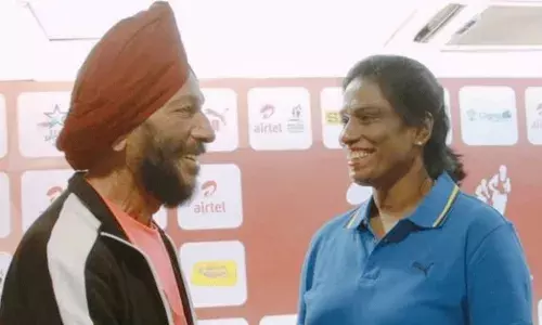 PT Usha with Milkha Singh