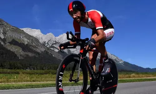 Olympic-bound cyclist Badreddin Wais was once wanted in Syria