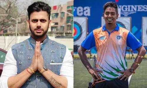 Crickter-turned-politician Manoj Tiwary (left) and archer Atanu Das