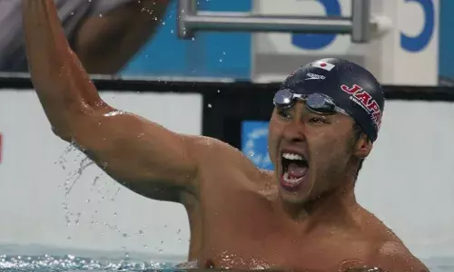 Kosuke Kitajima of Japan reacts after winning at Athens Olympics 2004