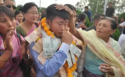 Sushila Devis reception at her hometown after her silver medal at CWG in 2014 (Source: Epao.net)