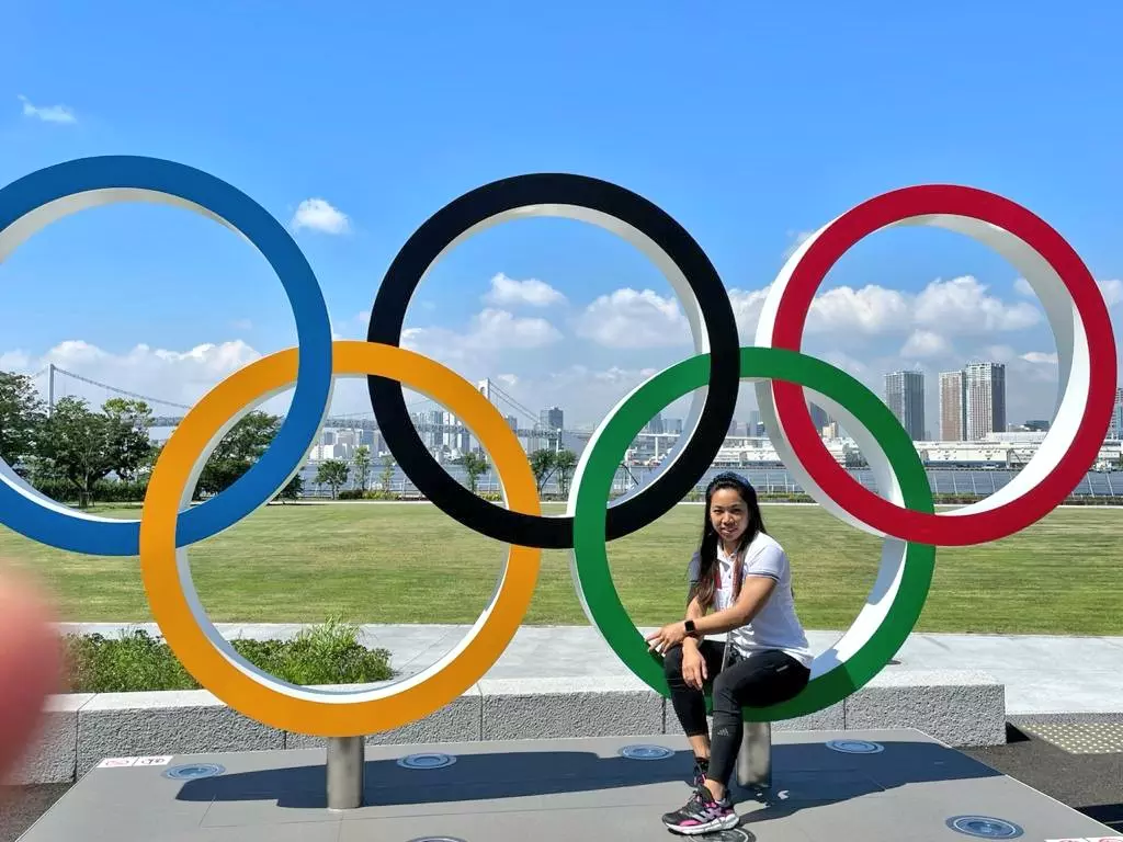 Mirabai Chanu posing in front of the Olympics Rings in Tokyo (Source: SAI) Mirabai Chanu posing in front of the Olympics Rings in Tokyo (Source: SAI)