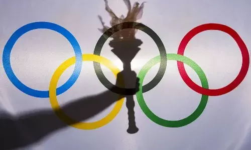 Olympic torch and the Olympic logo
