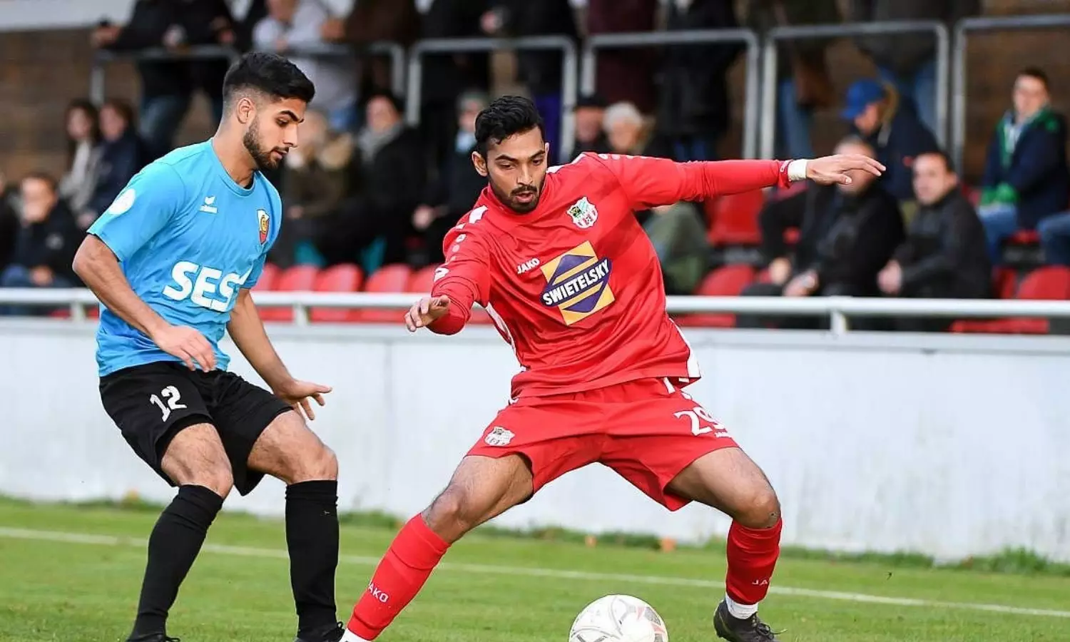 Vedaant (in red) playing for 6th division German club SBC Traunstein. Vedaant (in red) playing for 6th division German club SBC Traunstein.