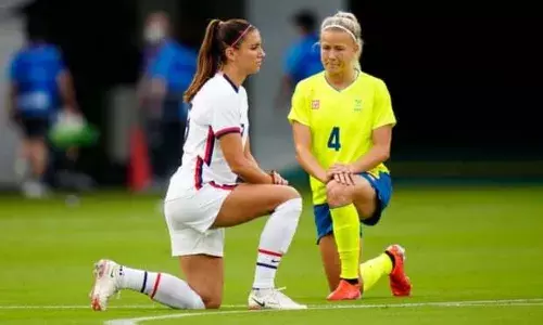 Tokyo Olympics social media team banned from showing athletes taking a knee