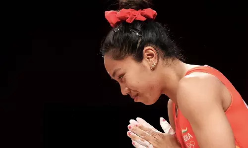 Mirabai Chanu wears Olympics earrings while winning a medal for India