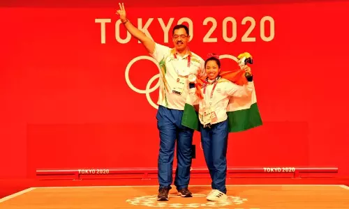 Olympics Silver Medalist Mirabai Chanu with coach Vijay Sharma