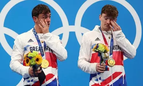 Photos of athletes after winning gold medals in Tokyo Olympics