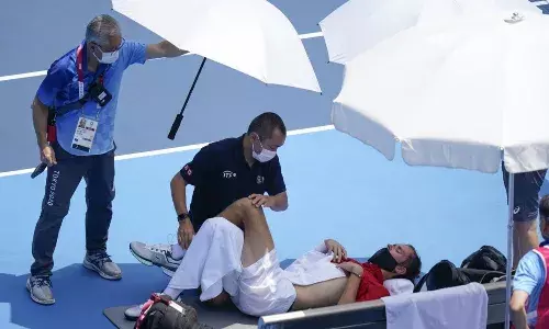 Daniil Medvedev struggling with the heat at the Ariake Tennis Park Daniil Medvedev struggling with the heat at the Ariake Tennis Park