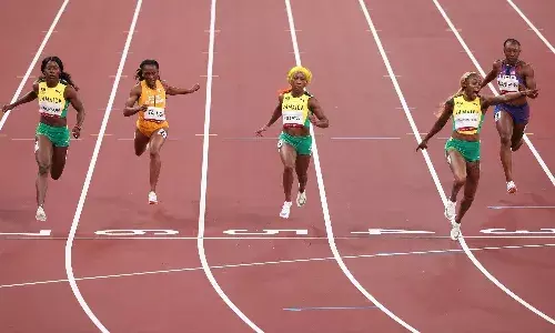 Thompson-Herah breaks Florence Joyners Olympic record in womens 100m