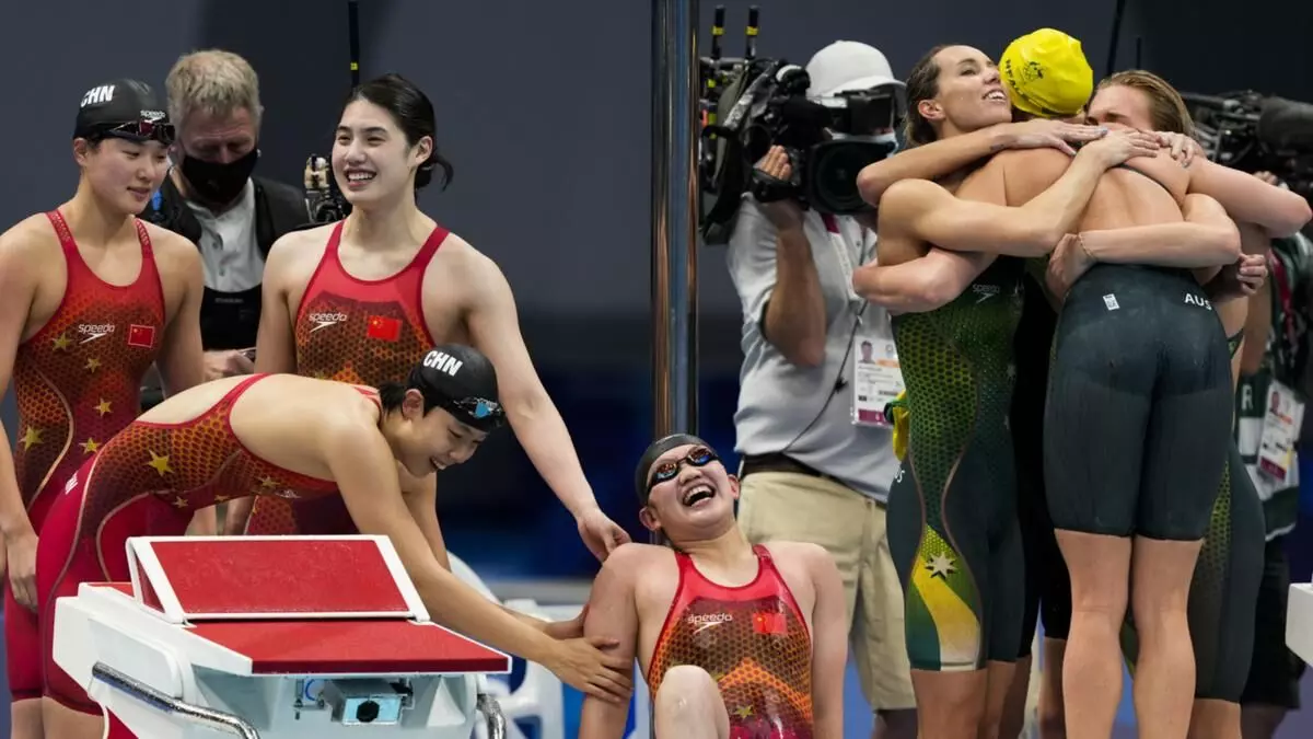 The Womens 4x200m Freestyle Relay was historic and all three podium finishers broke the former World Record. China caused a major upset by beating USA. Australia settled for bronze [Source: AP]