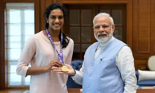 PM Narendra Modi with PV Sindhu