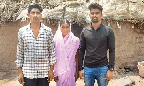 Archer Pravin Jadhav with his parents