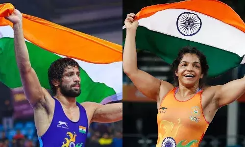 Ravi Kumar Dahiya and Sakshi Malik