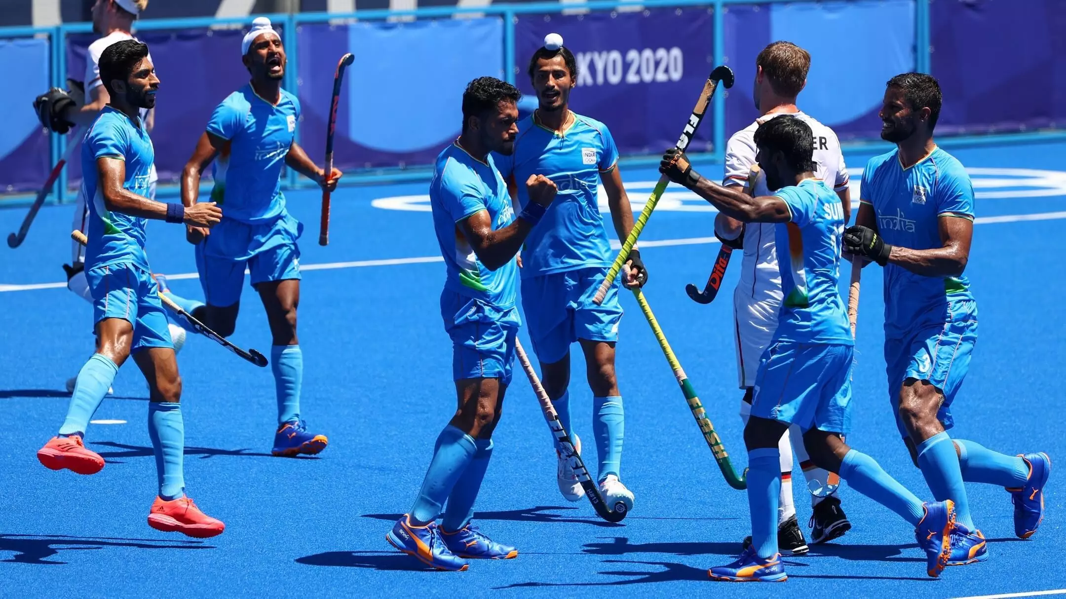 Indian hockey team celebrating goal against Germany