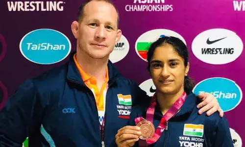 Vinesh Phogat with coach Woller Akos Vinesh Phogat with coach Woller Akos