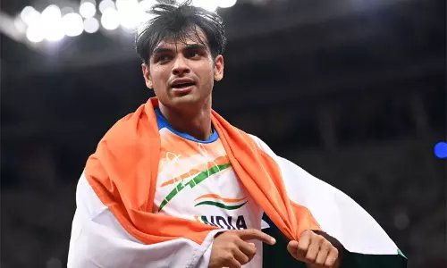 The Indian contingent at Tokyo Olympic Games Village gives a warm reception to Neeraj Chopra