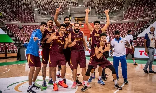 Indian National Basketball Team celebrating
