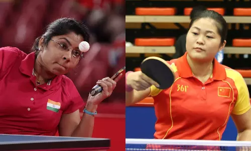 Bhavina Patel and Zhou Ying