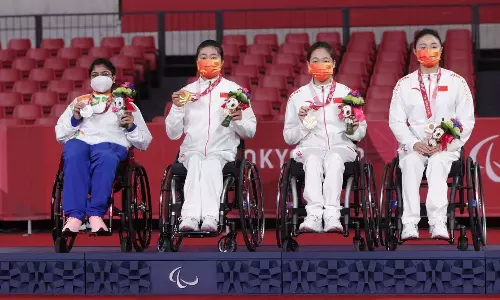 Bhavina Patel with other Chinese paddlers at the podium