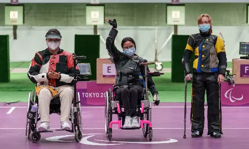 Avani Lekhara celebrating after winning gold at Tokyo Paralympics