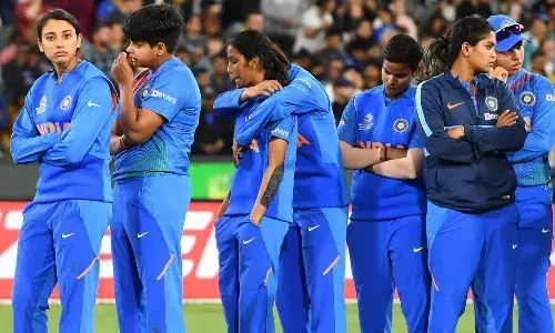 A devastated Indian womens cricket team after their loss to Australia in the 2020 Womens T20 World Cup