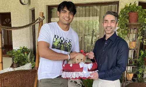 A golden bond: Abhinav Bindra gifts Neeraj Chopra a puppy named Tokyo