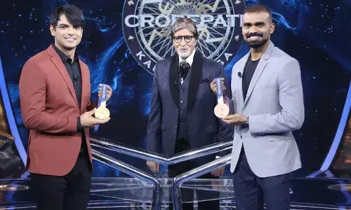 Indian Tokyo 2020 Olympic medallist Neeraj Chopra and PR Sreejesh on the sets of KBC (Source- Sony).jpg