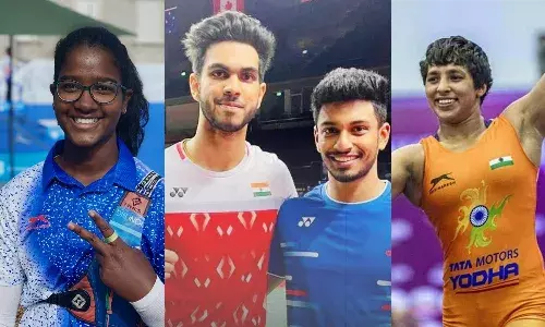 Archer Komalika Bari (left), shuttlers Dhruv Kapila and MR Arjun and wrestler Anshu Malik