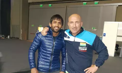Wrestler Bajrang Punia and his coach Shako Bentinidis (Source: Olympics)