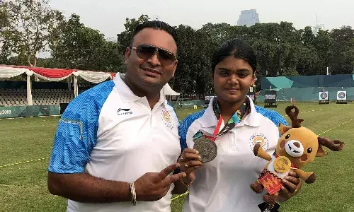 Jiwanjot Singh with Jyothi Surekha at the 2018 Asian Games (Source- Jiwanjot Singh Teja/Facebook).jpg