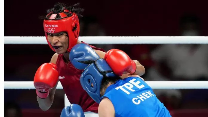 Lovlina Borgohain in action against Chen Nien-Chin of Chinese Taipei (Source: Reuters) Lovlina Borgohain in action against Chen Nien-Chin of Chinese Taipei (Source: Reuters)