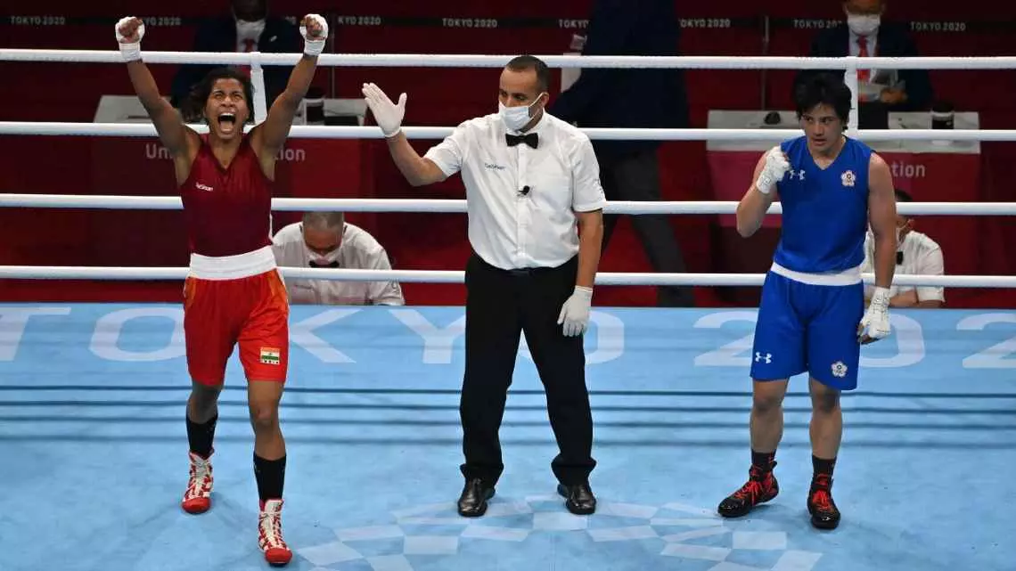 Roaring to life - Lovlina Borgohain (in red) erupts in joy after winning bronze (Source: Getty) Roaring to life - Lovlina Borgohain (in red) erupts in joy after winning bronze (Source: Getty)
