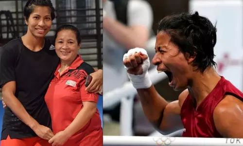 Boxer Lovlina Borgohain with her coach Sandhya Gurung