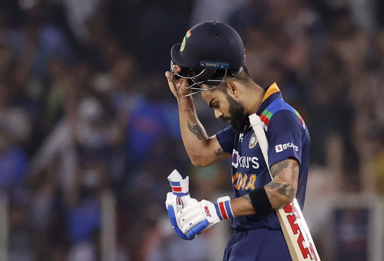 Virat Kohli walks off the pitch (Source: Reuters)