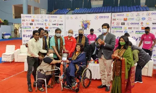 Odisha Sports Minister Tusharkanti Behera with para shuttlers at the inauguration of National Para Badminton Championship