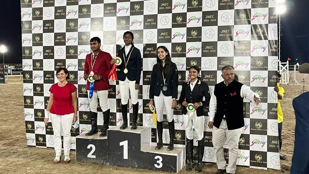 Kavya Gopal on the podium along with other medallists