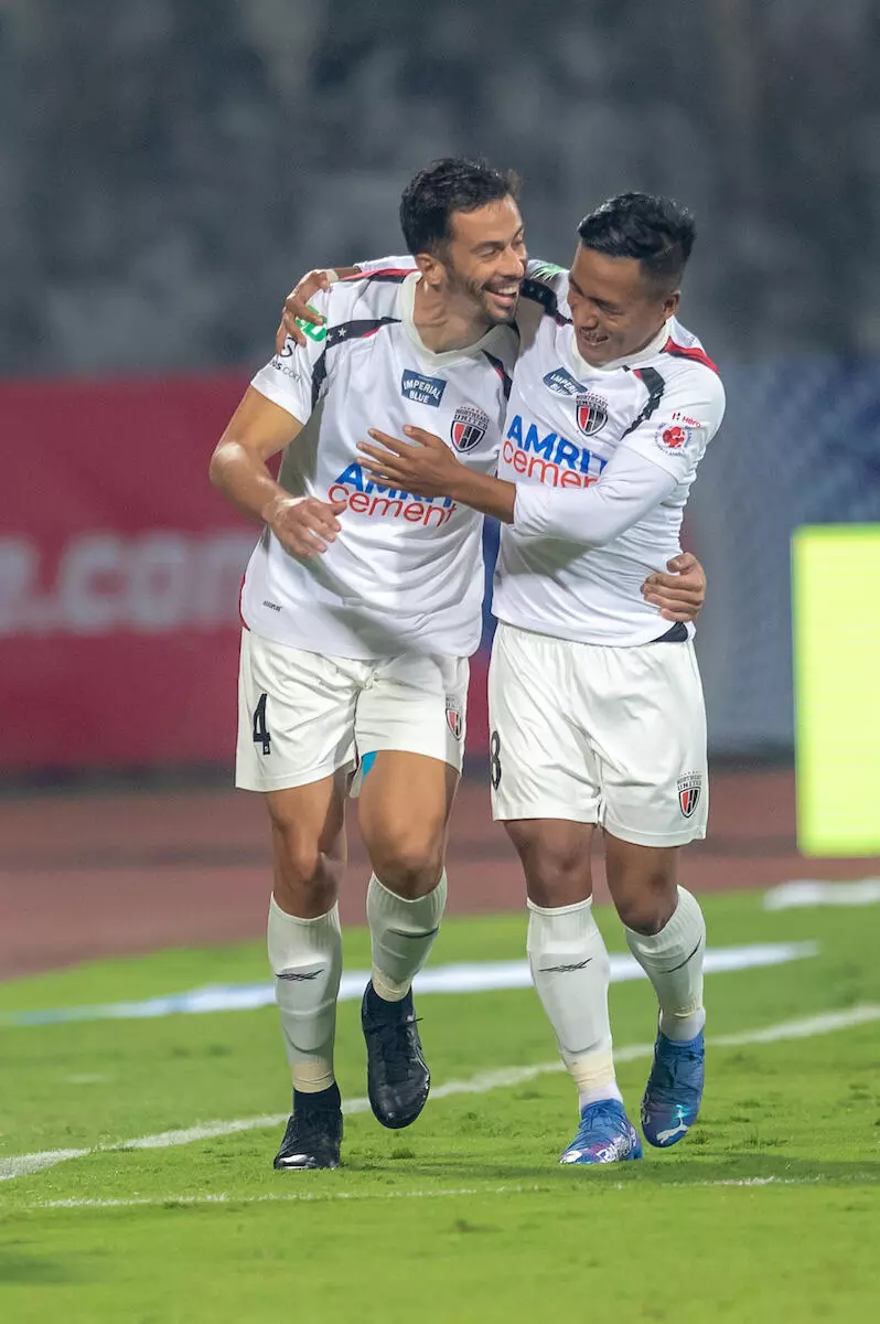 NEUFCs Hernan Santana celebrates with team mate Imran Khan after scoring a goal in the first half of the match against FCG; (Image via ISL)