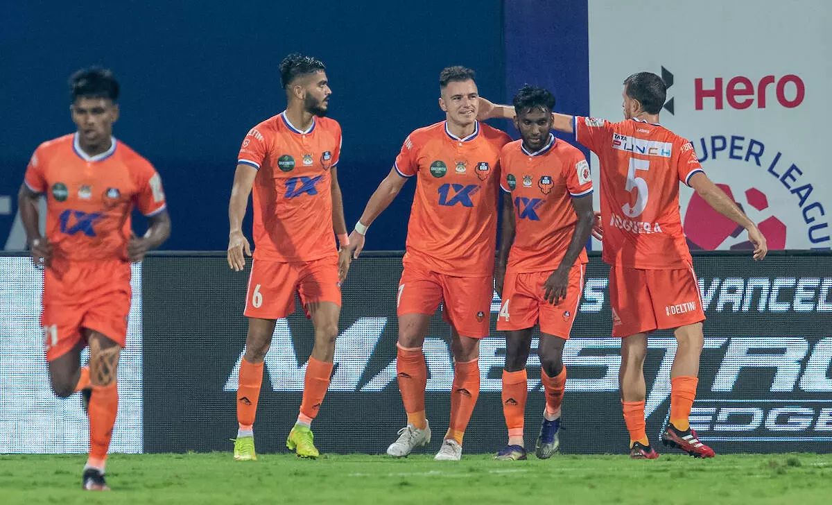 FC Goas Airan Cabrera celebrates with teammates after scoring an equalizer in the first half of the match against NEUFC; (Image via ISL)