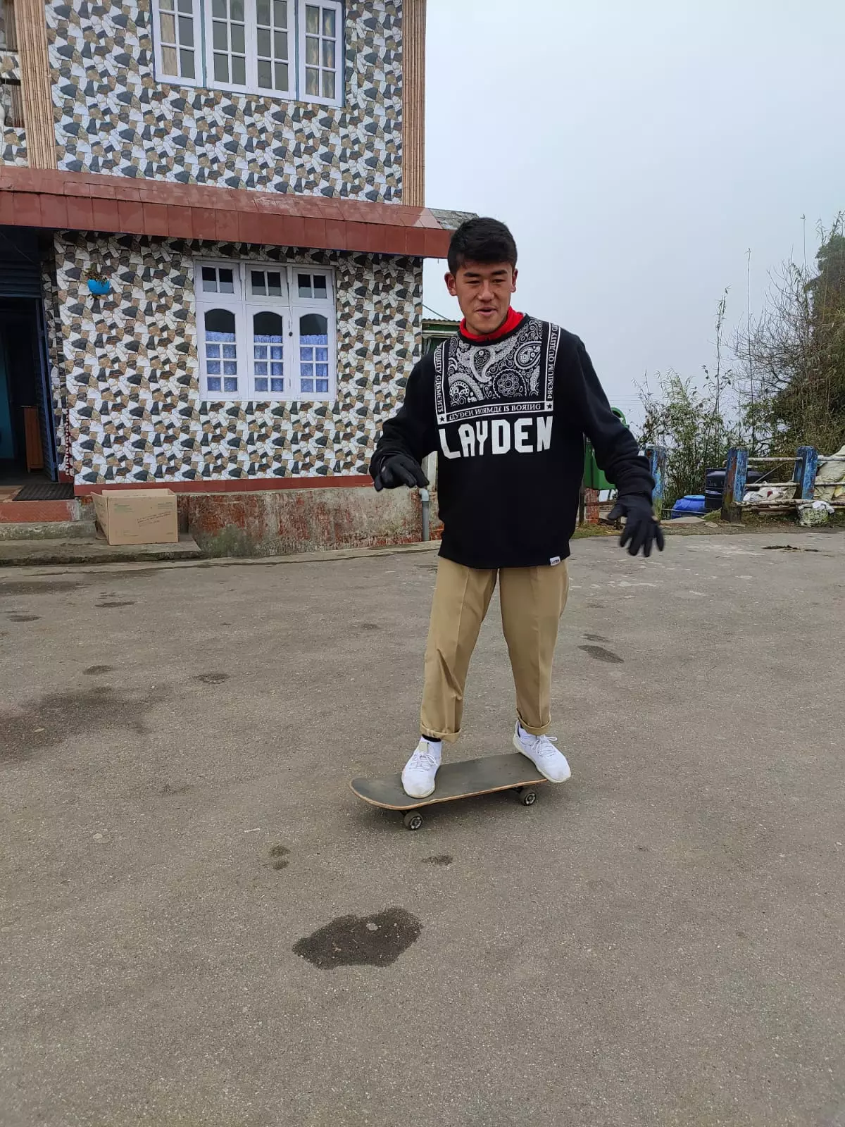 Pemba Dorjee Sherpa, 20, aboard his skateboard at Jorepokhari (Source: Author)