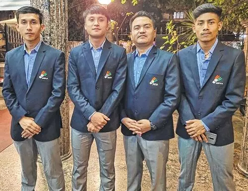 Manipurs badminton talents - Manjit Singh (left), Meiraba, Coach Rinky Singh and Dingku Singh 